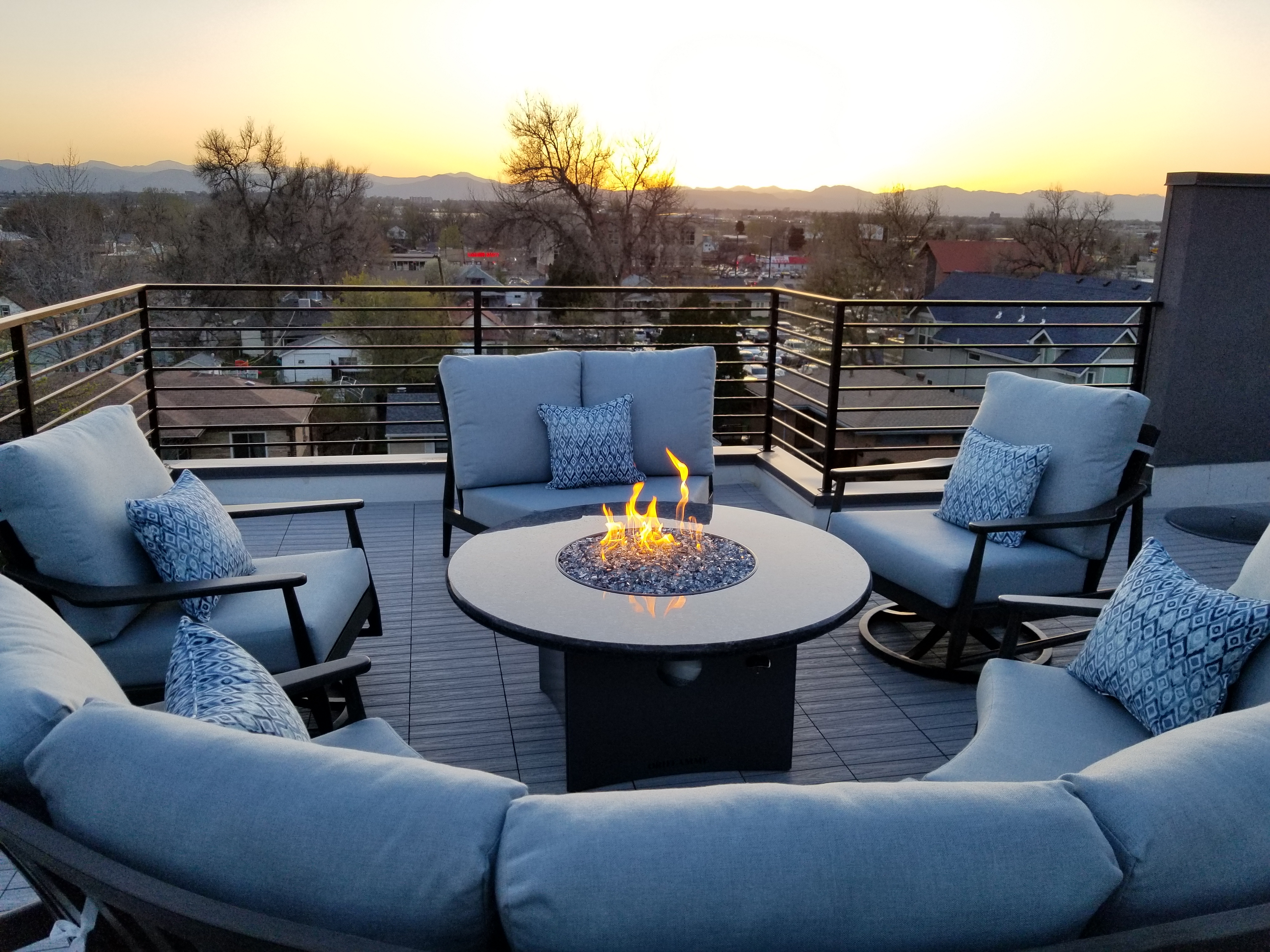 Oriflamme Blue Pearl Granite fire tables photo — Splash City