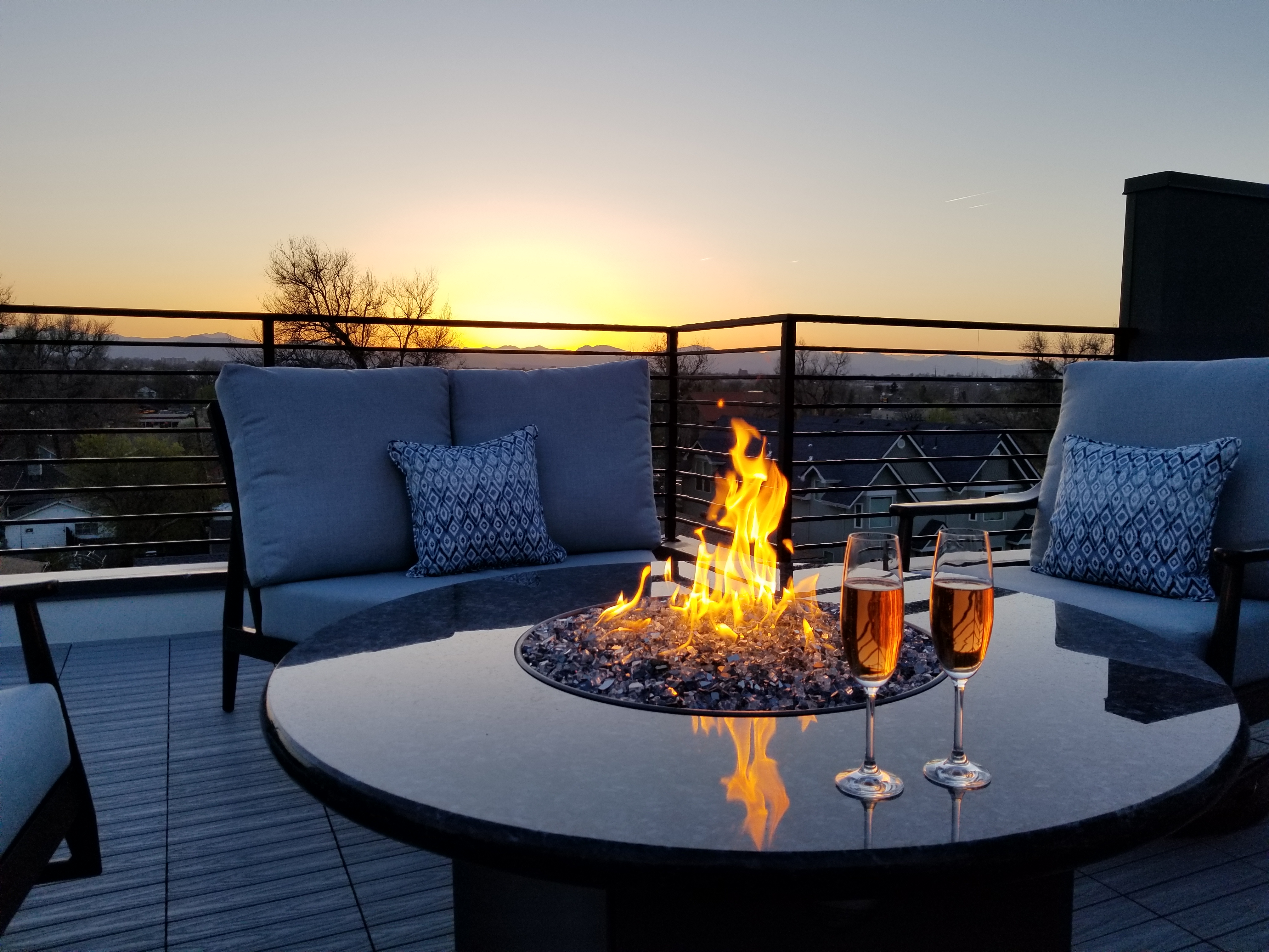 Oriflamme Blue Pearl Granite fire tables photo — Splash City